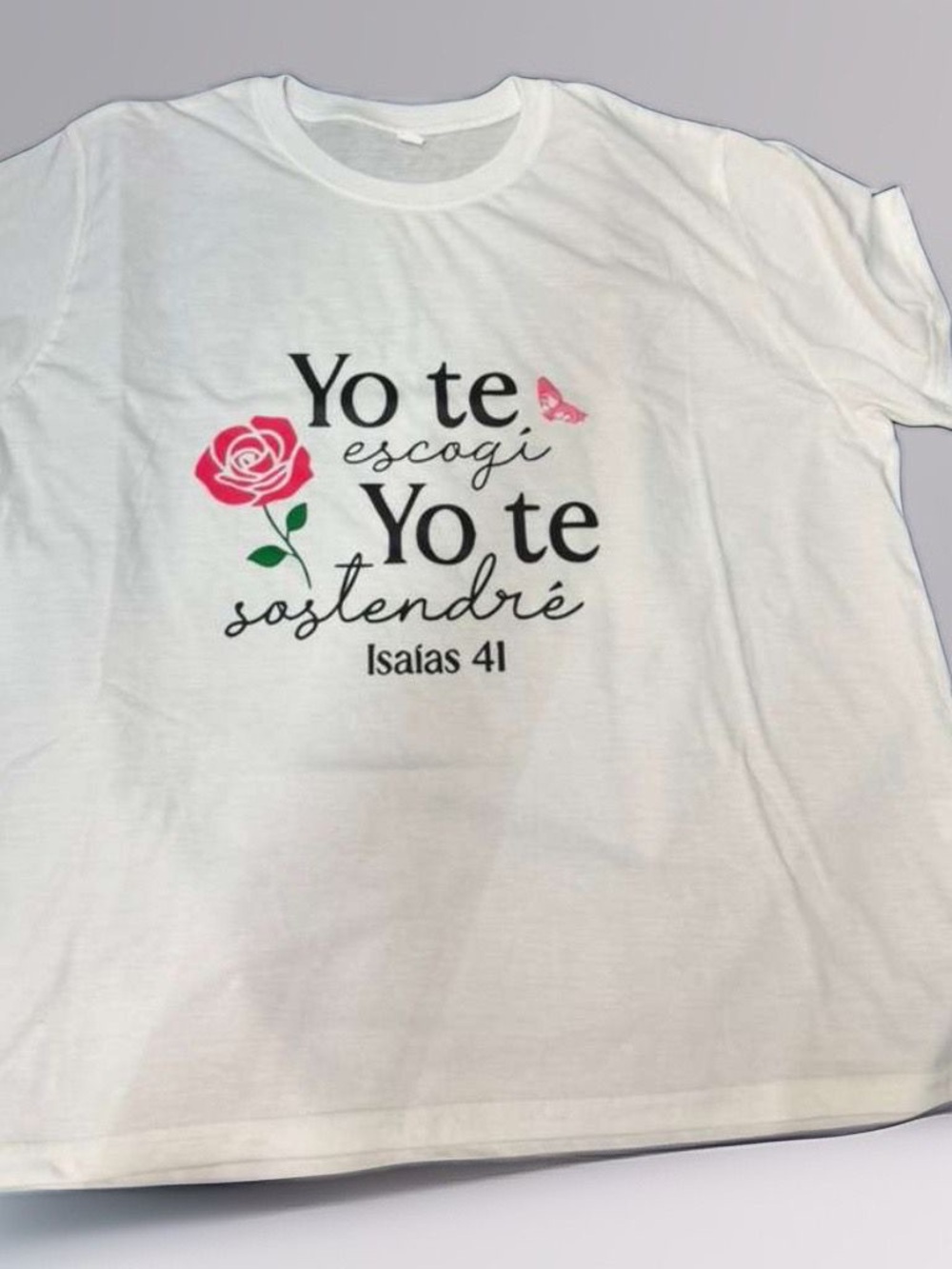 White Graphic Tee with Spanish Scripture and Rose
